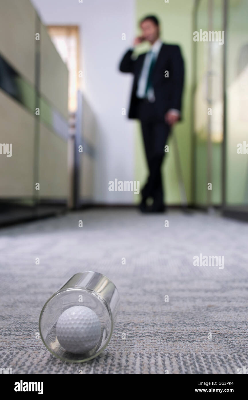 Golf ball in glass Stock Photo Alamy