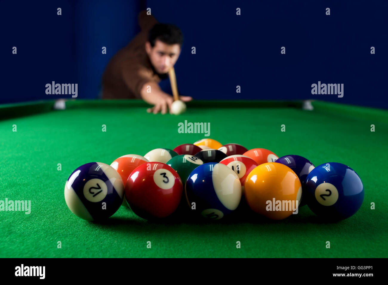Man about to break billiard balls Stock Photo Alamy