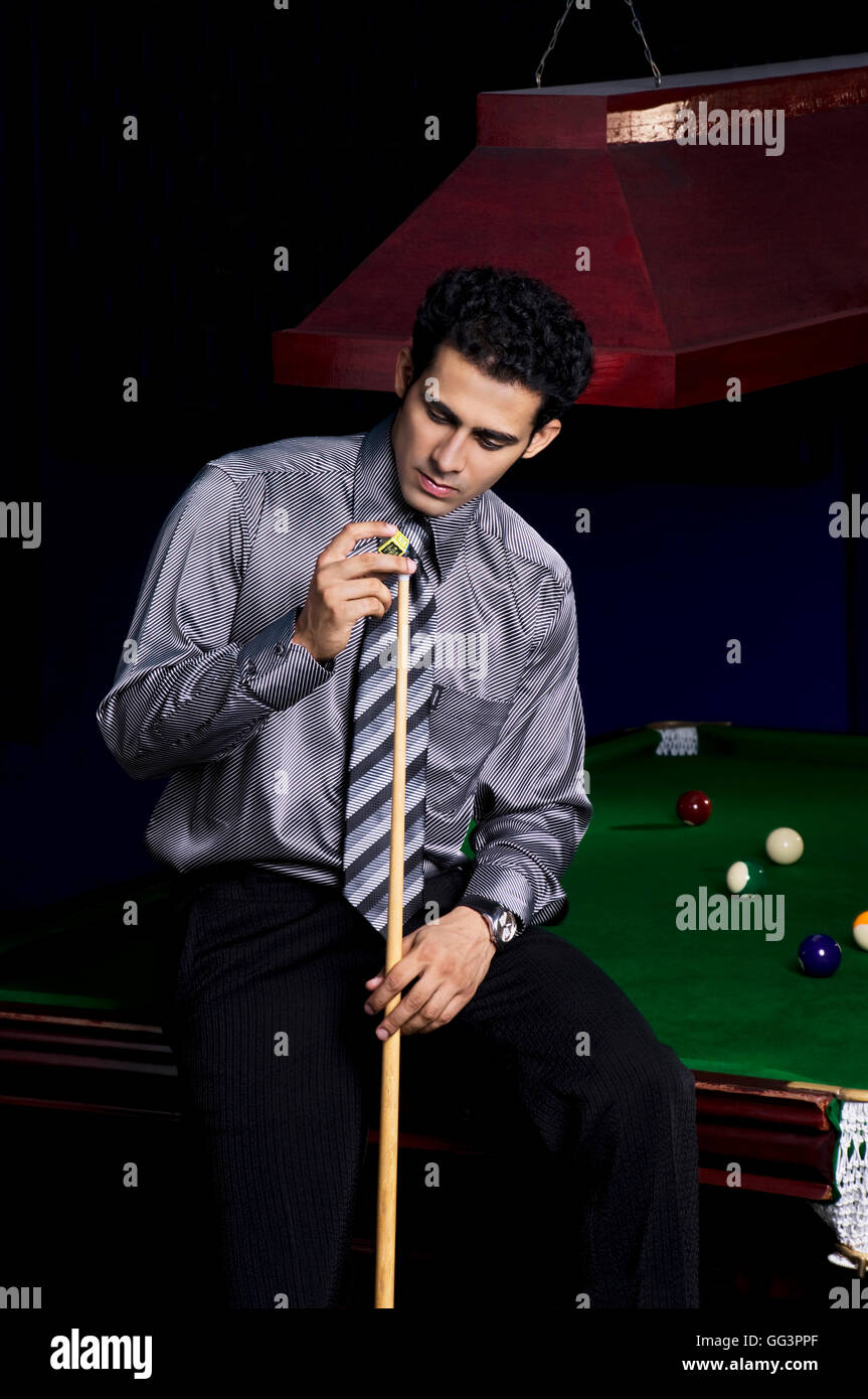 Applying chalk to the cue tip hires stock photography and images Alamy