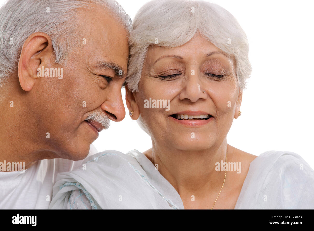 Old couple smiling Stock Photo