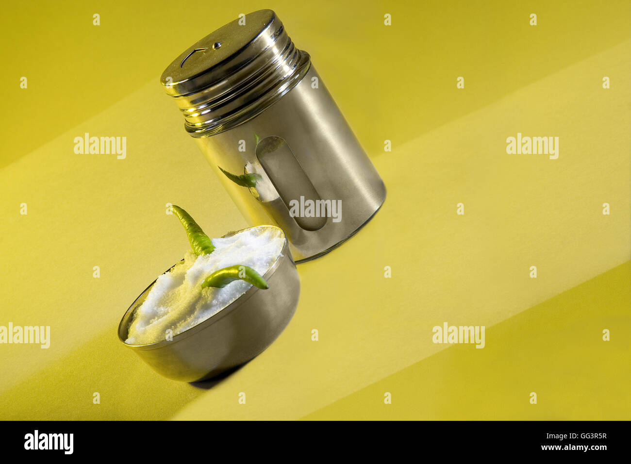 Salt cellar with a bowl of salt Stock Photo Alamy