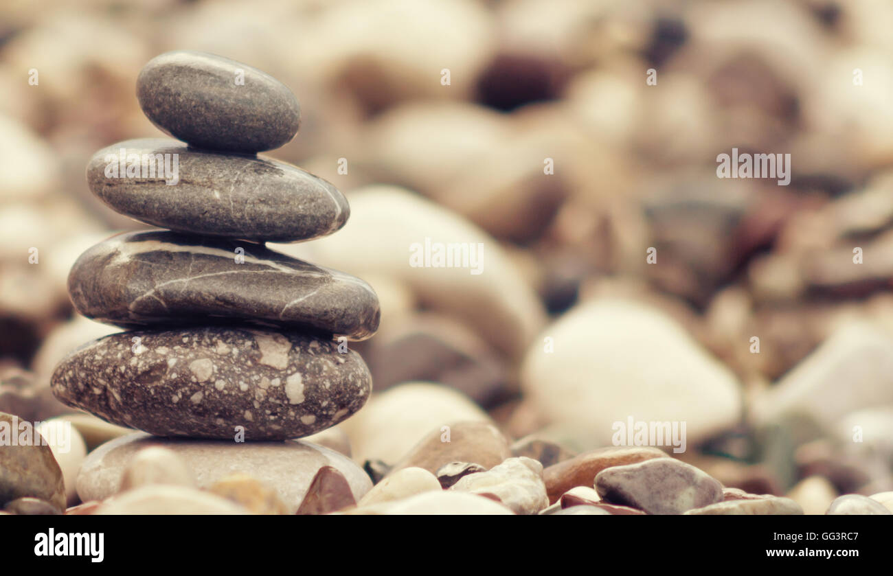 balancing stone tower on the beach Stock Photo - Alamy