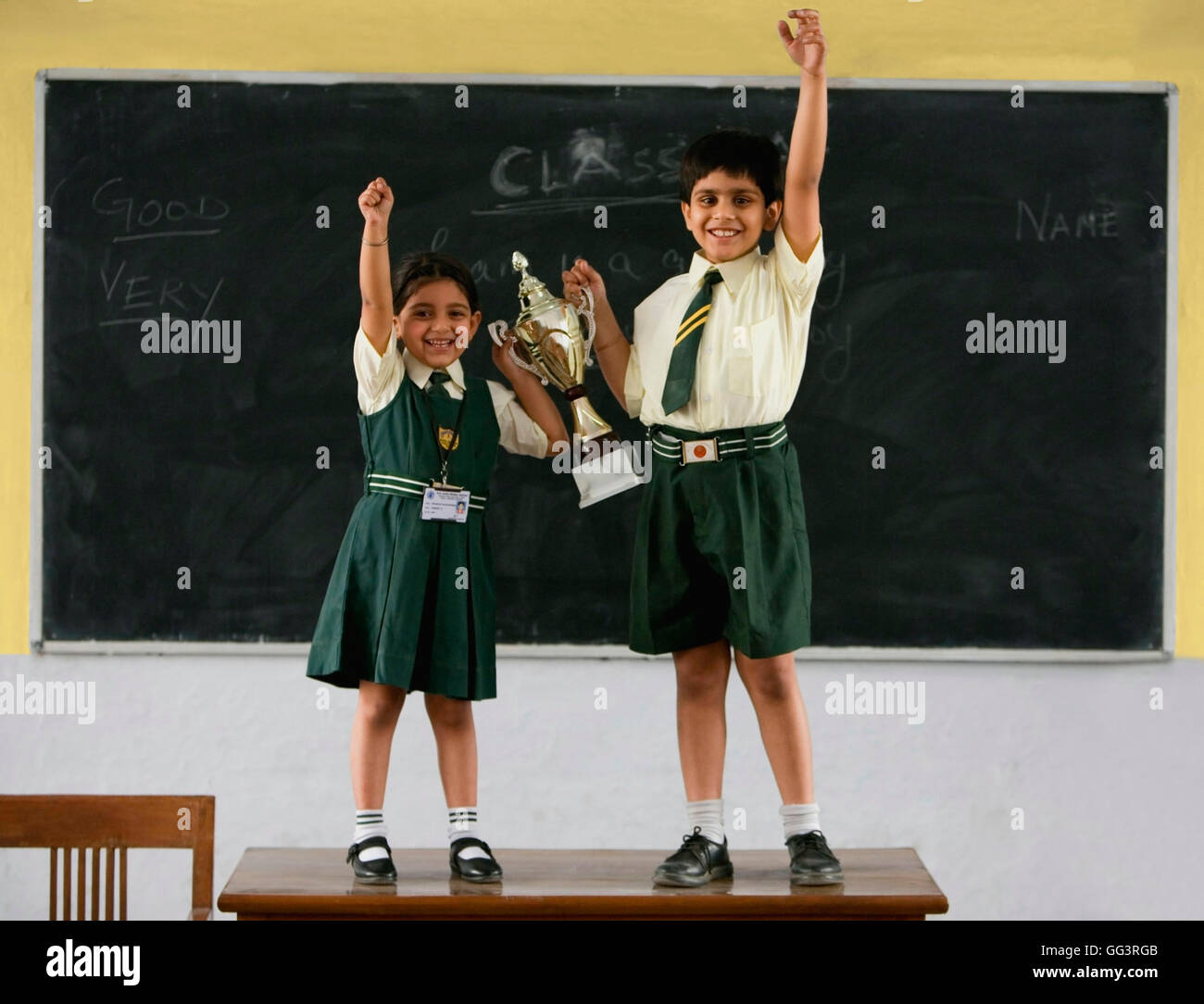 Students holding a trophy Stock Photo