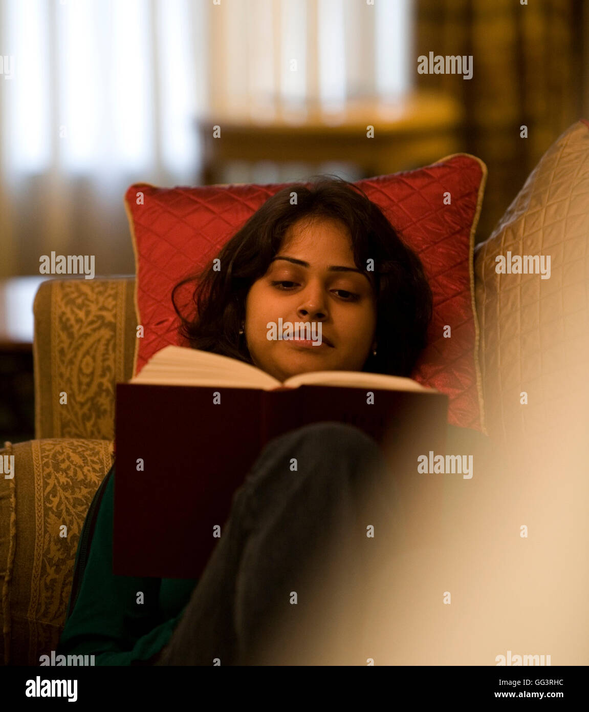 Indian girl reading a book hi-res stock photography and images - Alamy