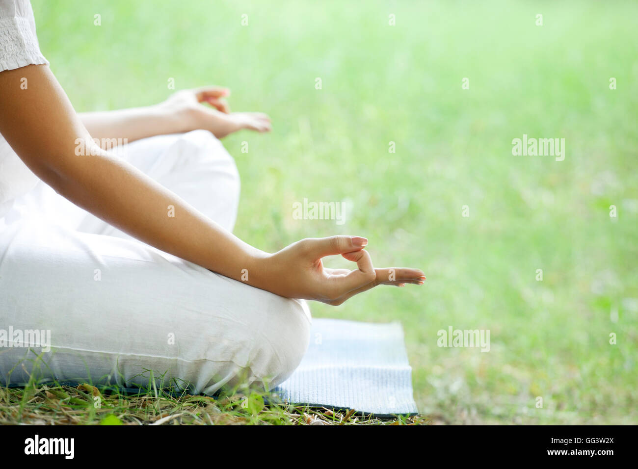 Woman's hand in a meditative gesture Stock Photo