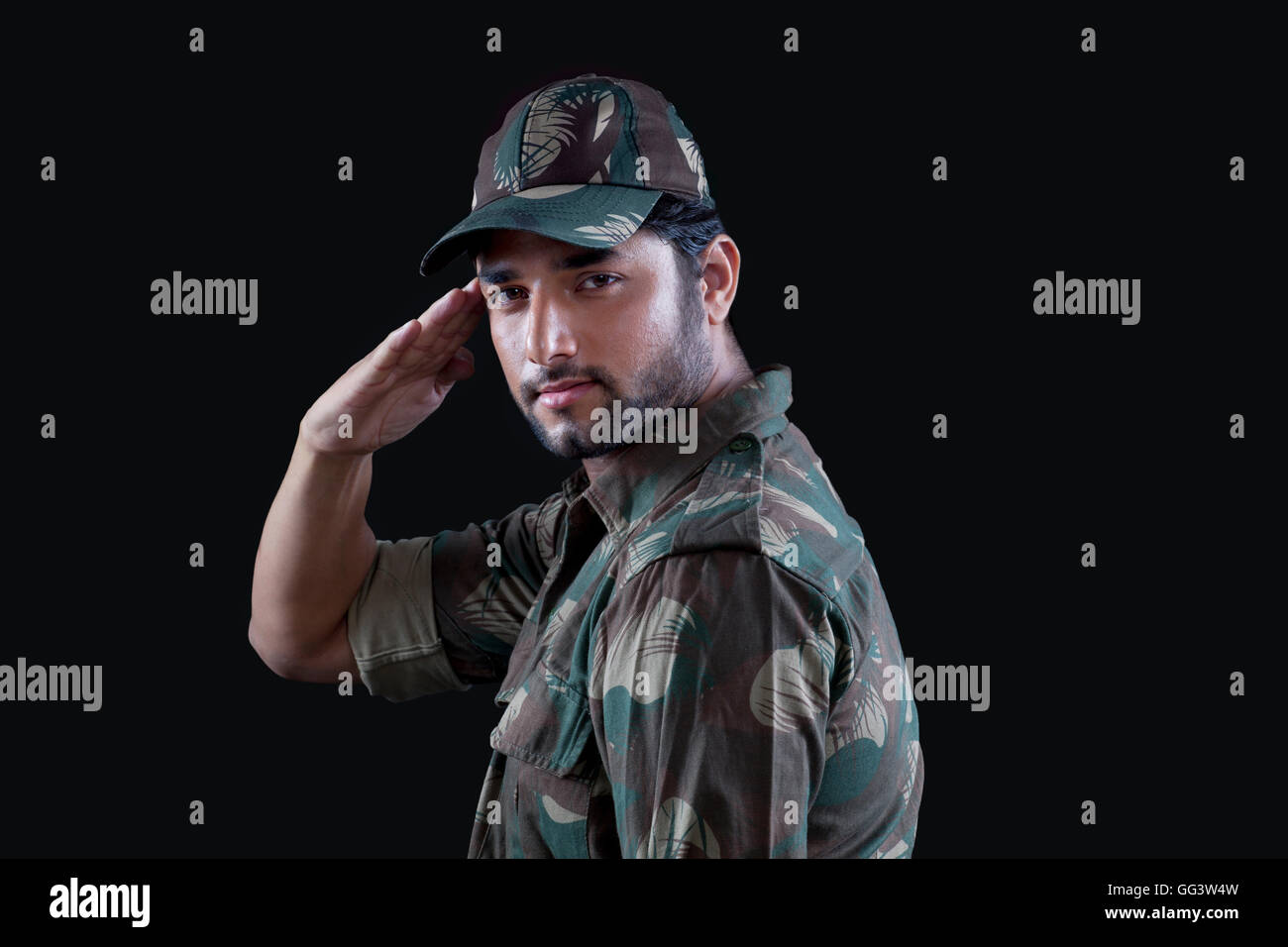 Young military officer saluting Stock Photo - Alamy