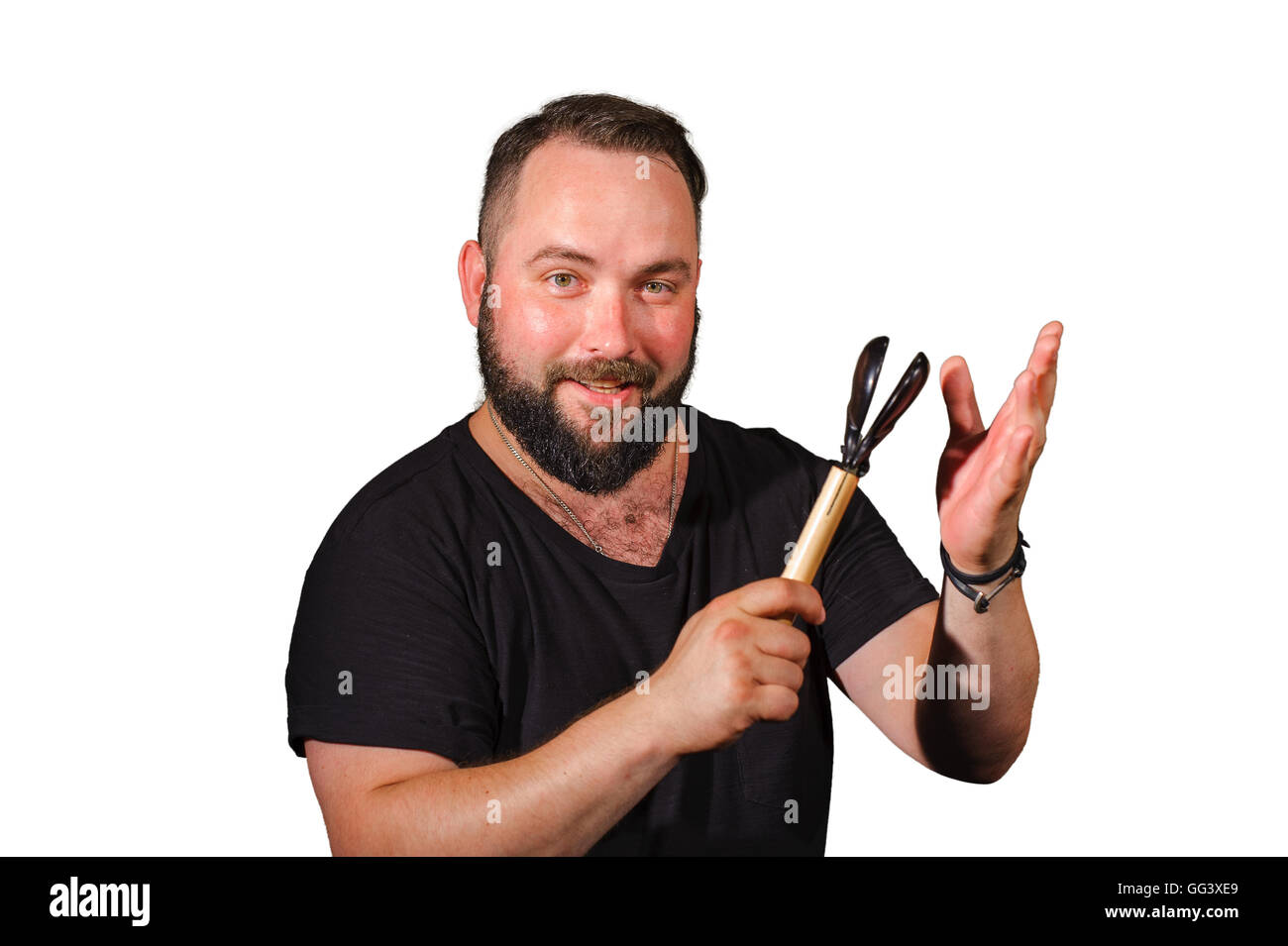 One man with a beard play on the percussion music instruments.isolated ...