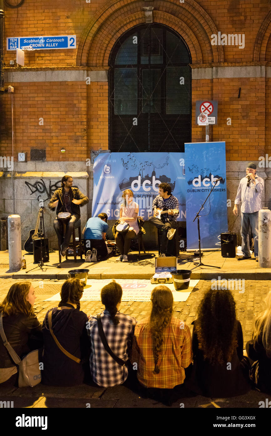 audience listening to Dublin City Buskers, Temple Bar, Dublin, Ireland