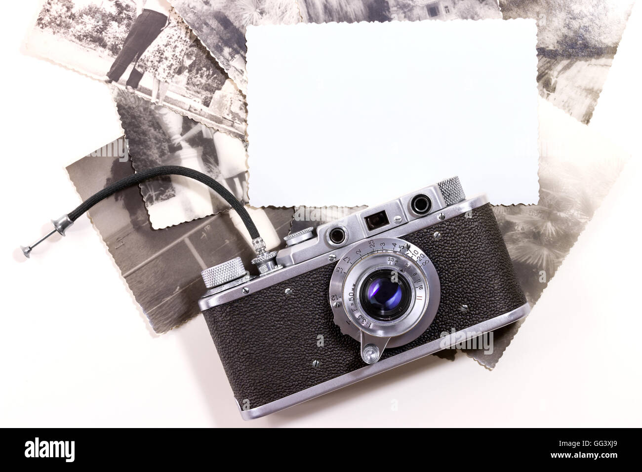 Classic camera and old photos Stock Photo
