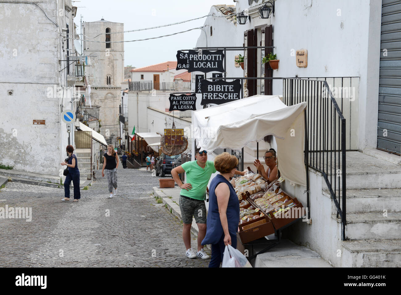 Monte Sant'Angelo, Italy - 28 June 2016: people shopping on the tourist shops of Monte Sant'Angelo on Puglia, Italy. Stock Photo