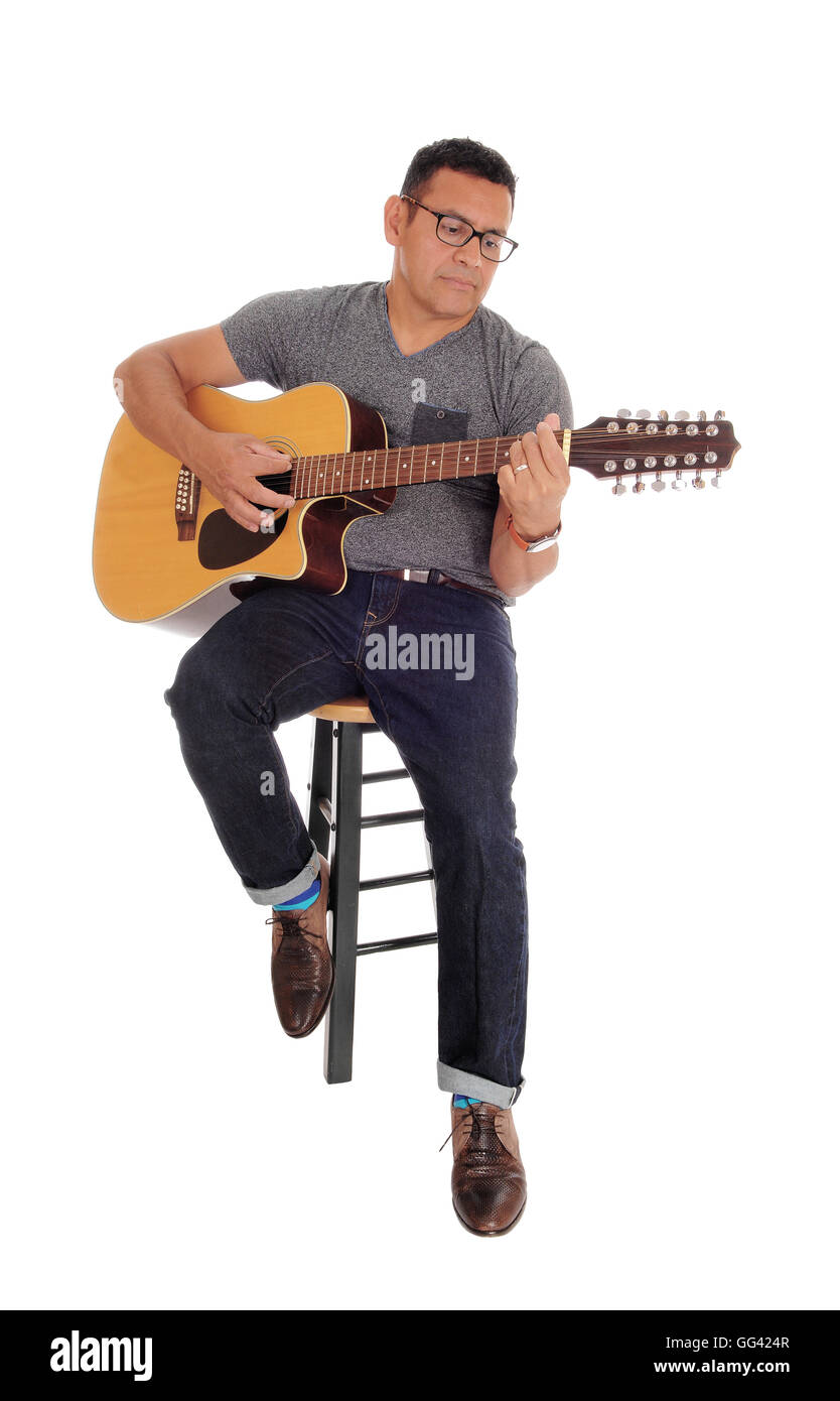 Acoustic Guitar Player On Stool