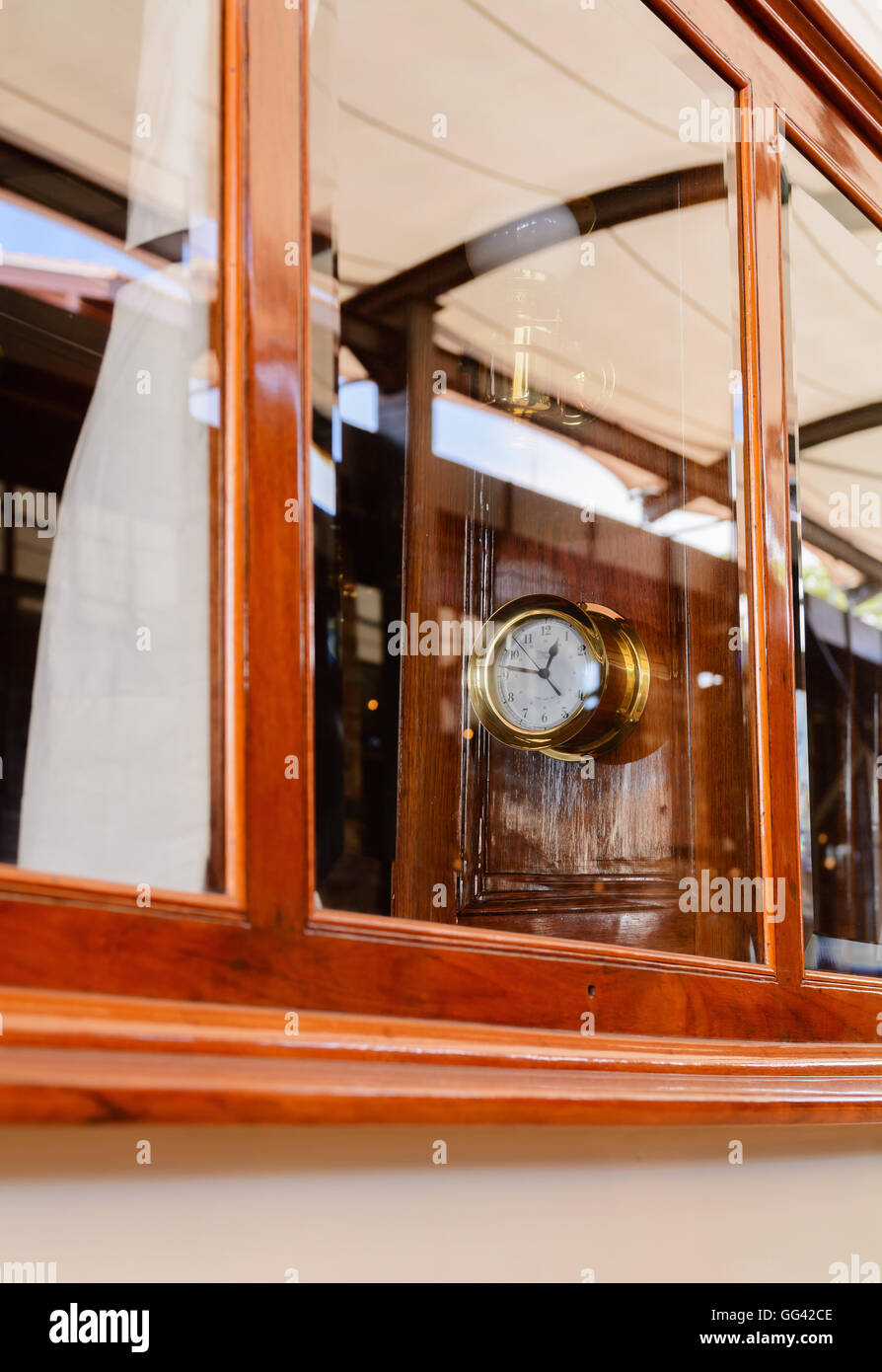 old retro clock with roman numerals behind glass Stock Photo - Alamy