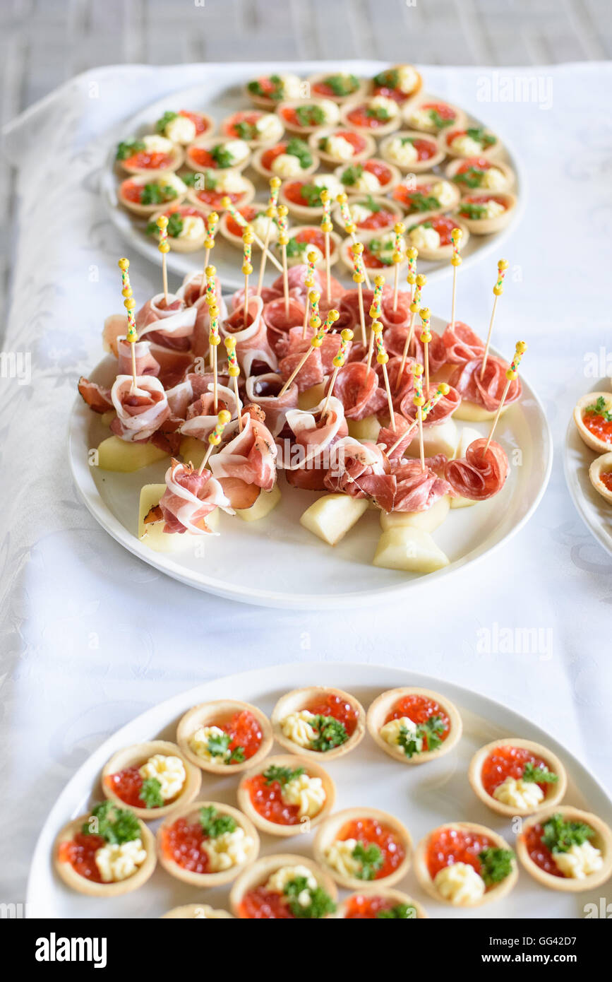 Italian prosciutto ,raw ham leg sliced on white plate Stock Photo Alamy