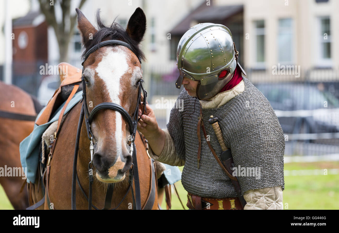 Members of Comitatus, a Roman reenactment society from York, prepare to perform in Carmarthen, Wales Stock Photo