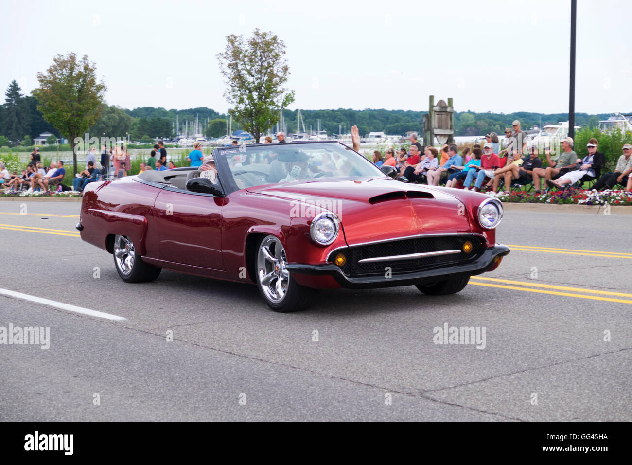 Remodeled 1950s era Mercury convertible participates in 2016 Annual Cruz In Parade through Montague, Michigan. Stock Photo