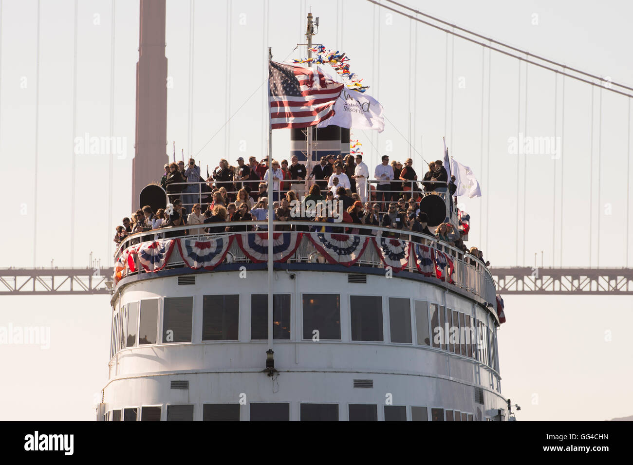Crowded upper decks of the California Hornblower sight seeing boat on San Francisco harbor. Stock Photo