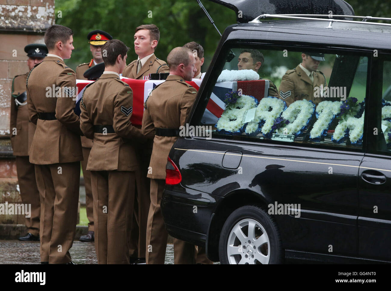 The coffin of Corporal Josh Hoole is carried into Crichton Memorial church in Dumfries for his funeral by colleagues and brother Tyrone (centre, facing camera). Stock Photo