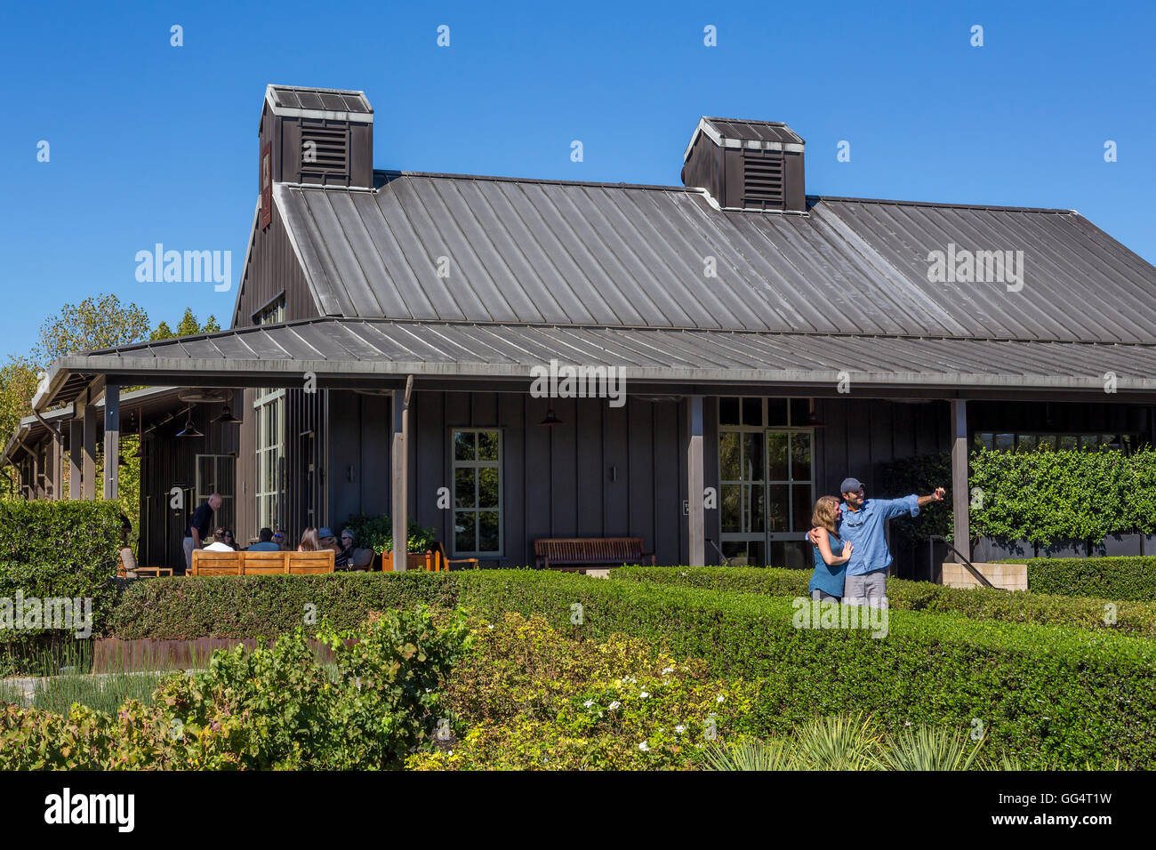 Couple, tourists, selfie, selfie photo, posing for photo, outdoor tasting patio, Alpha Omega Winery, Napa Valley, California Stock Photo