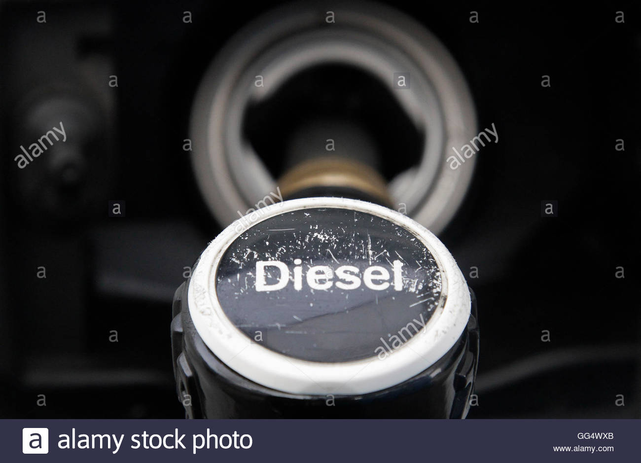 Image result for A fuel nozzle is seen at a gas station in Berlin April 3, 2012.