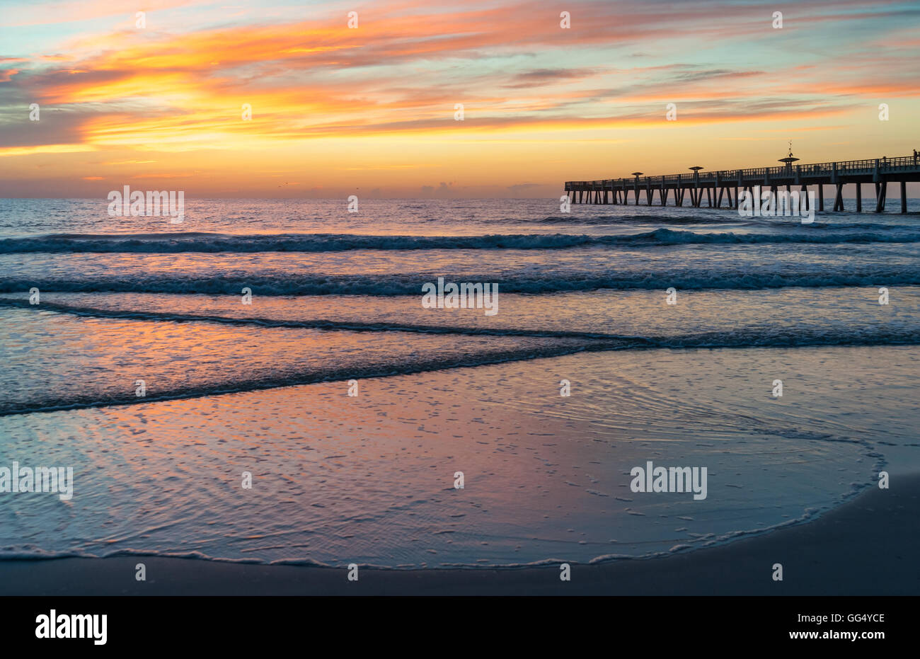 Colorful Florida sunrise at Jacksonville Beach Pier. (USA) Stock Photo