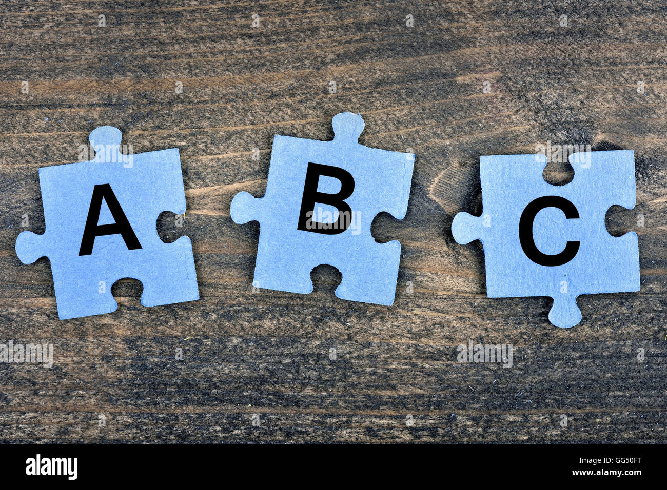 Puzzle pieces with word ABC Stock Photo Alamy