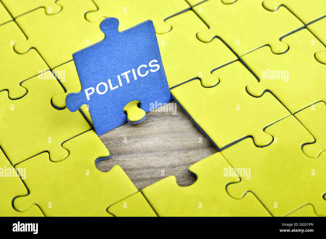Puzzle pieces with word Politics Stock Photo Alamy