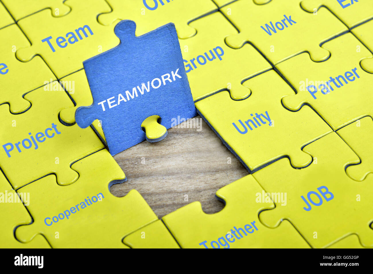 Puzzle pieces with word Teamwork Stock Photo Alamy