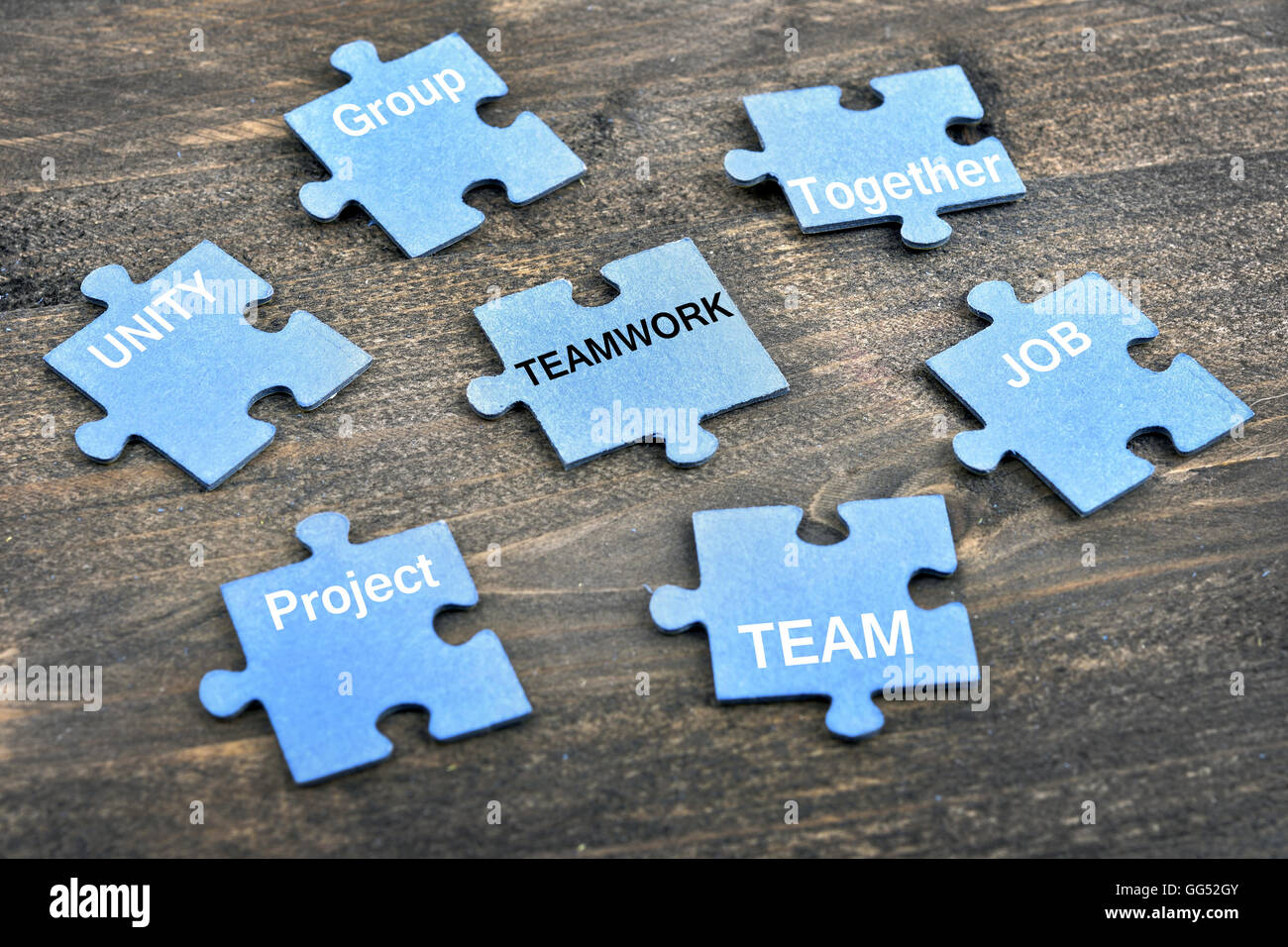 Puzzle pieces with word Teamwork Stock Photo