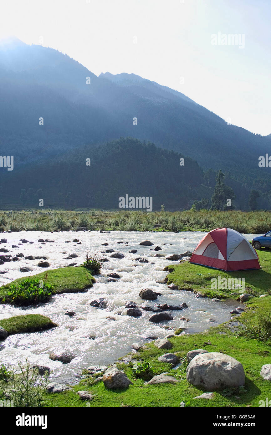 A tent by the river Stock Photo - Alamy