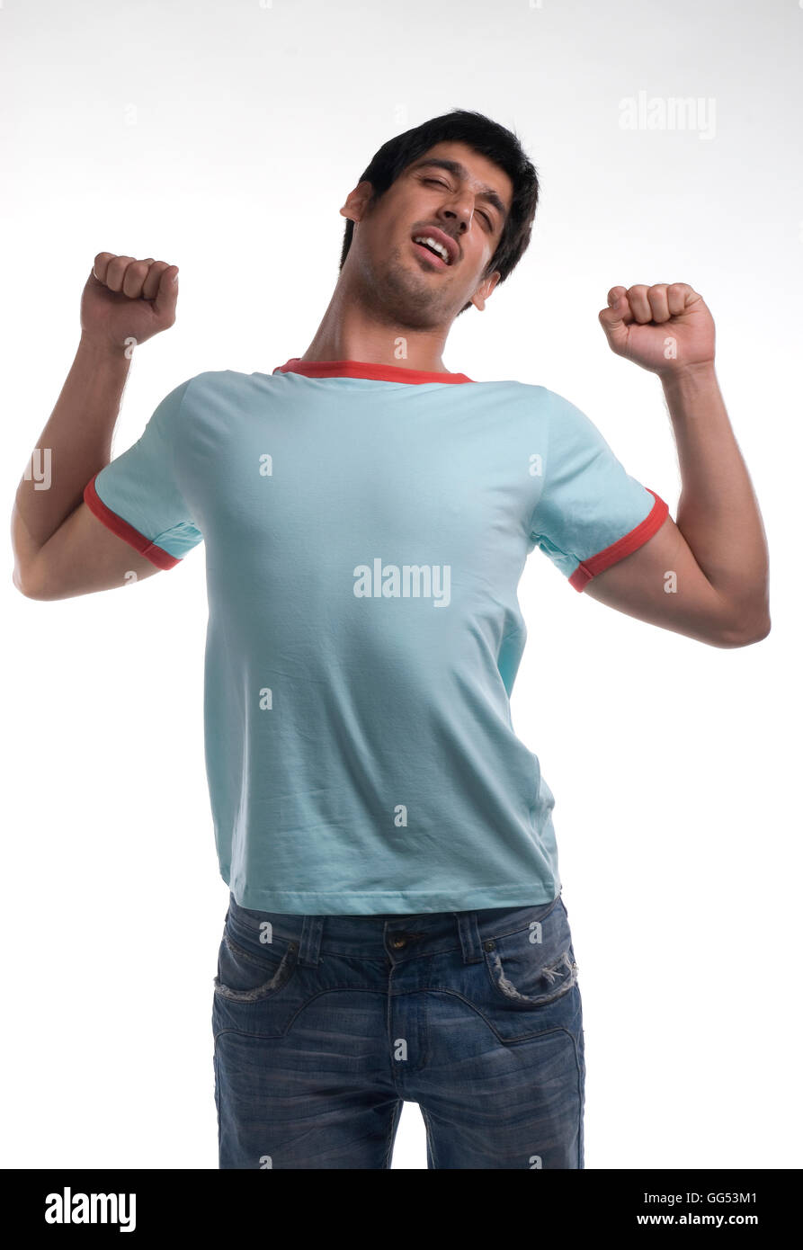 Sleepy man stretching arms hi-res stock photography and images - Alamy