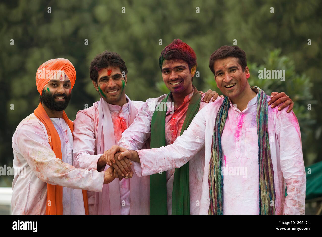 Men celebrating Holi Stock Photo