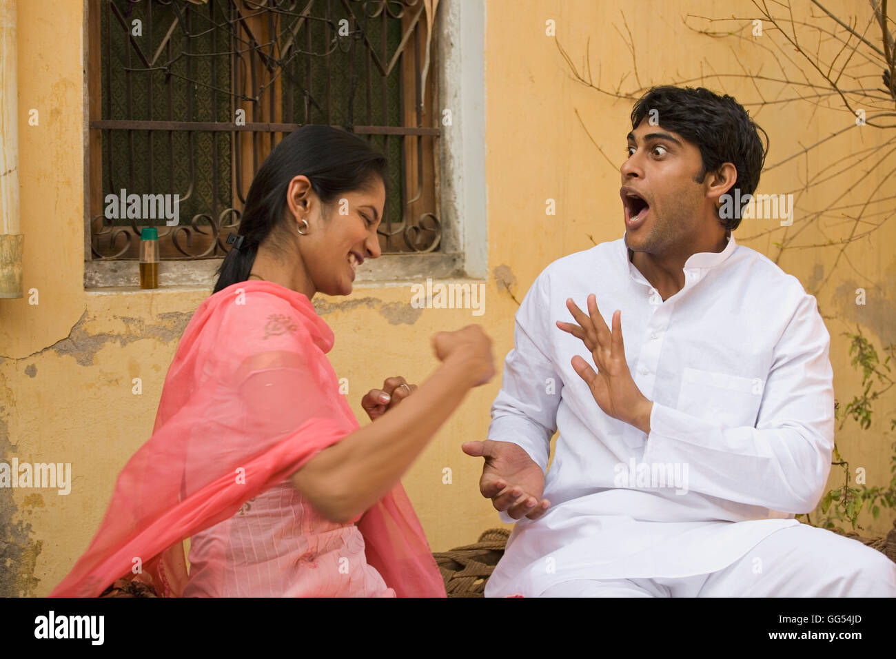 A rural couple joking Stock Photo