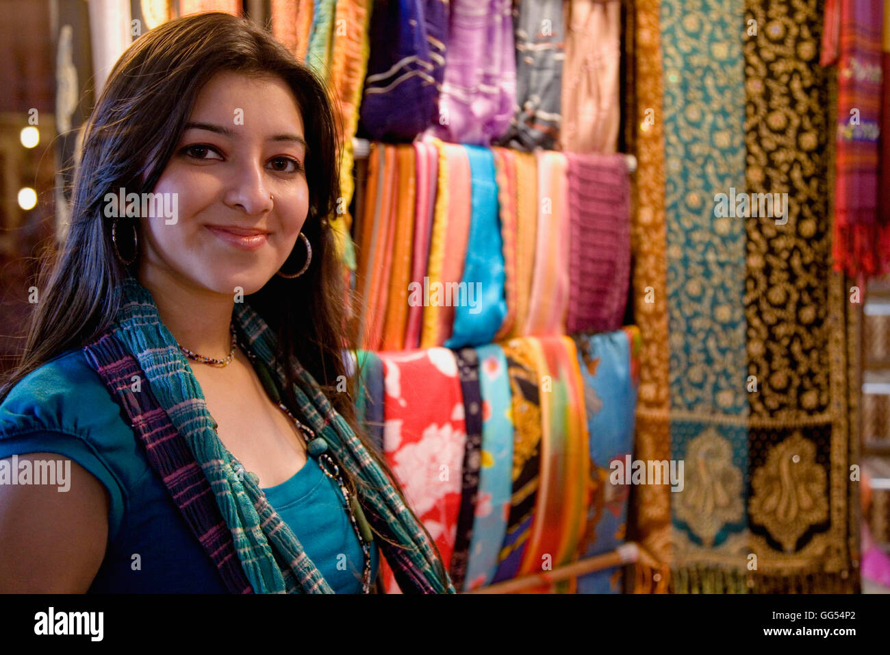 Girl in front of a garment shop Stock Photo