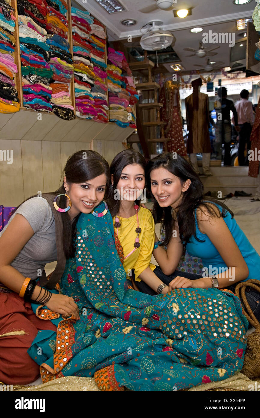 Girls at a garment shop Stock Photo