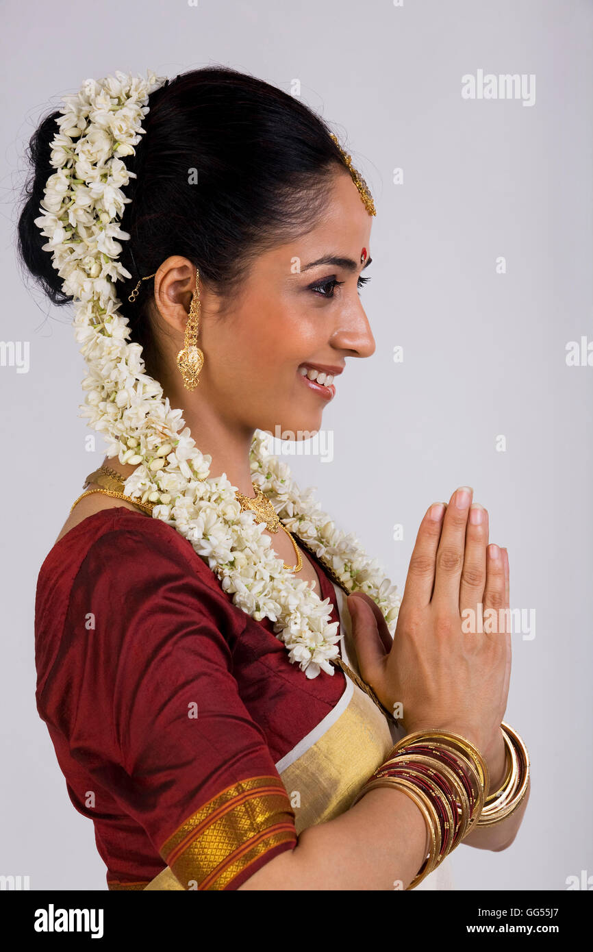 South Indian woman greeting Stock Photo - Alamy