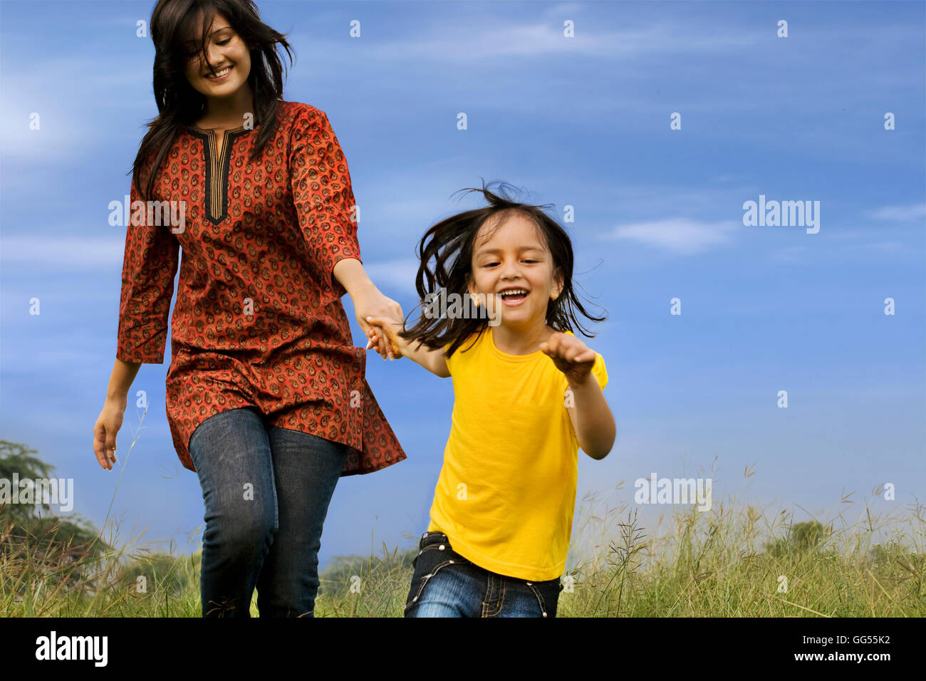 Mother and daughter in a park Stock Photo