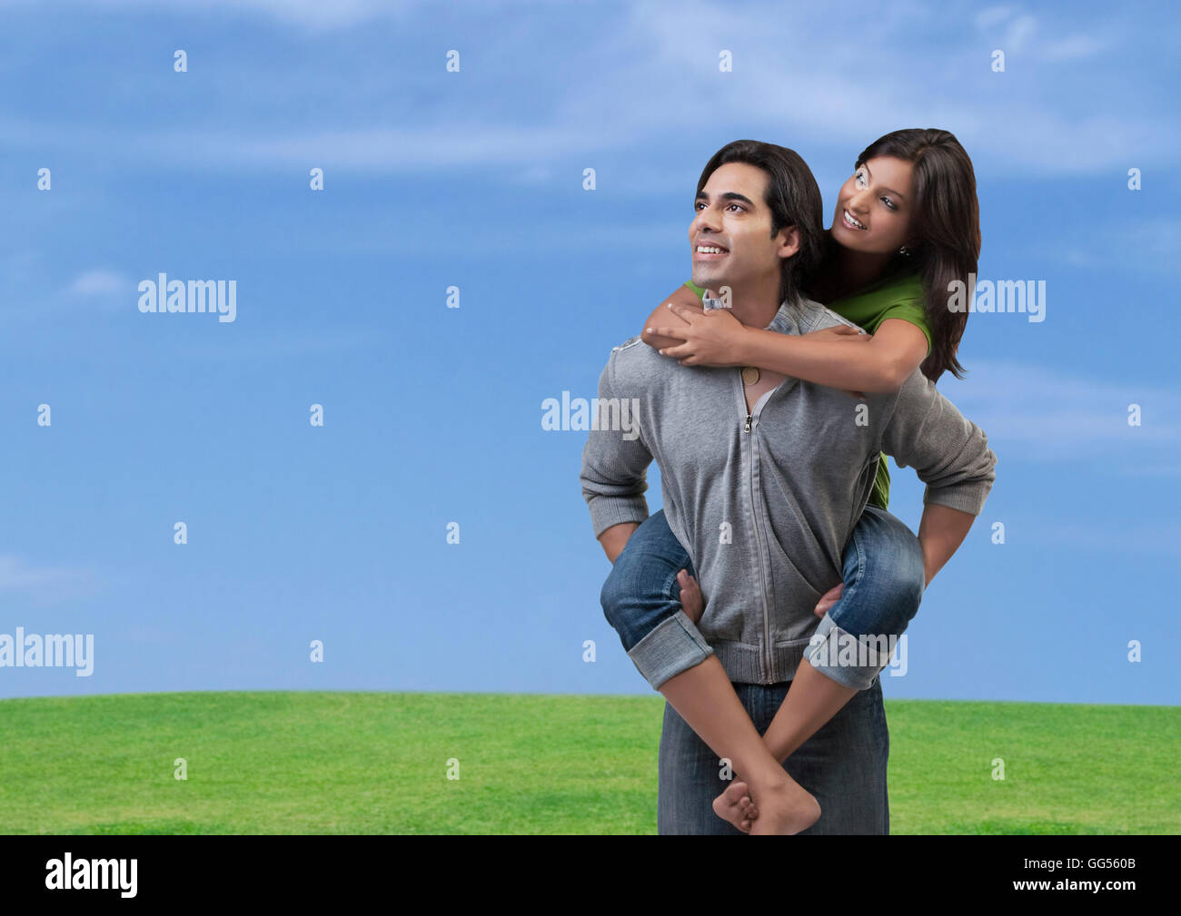 Midadult Caucasian Woman Giving Man Piggyback Stock Photo 3194063