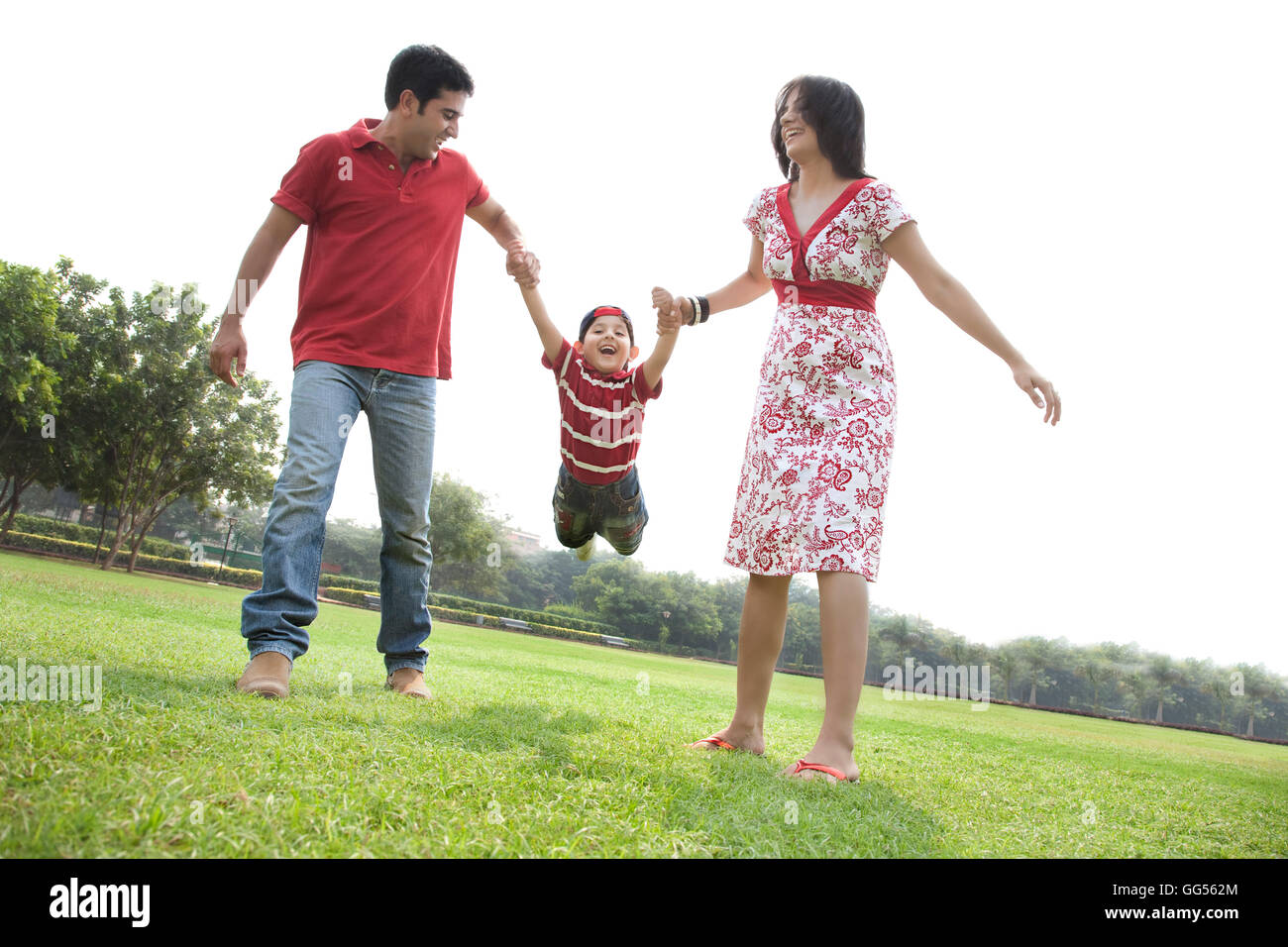 Son having fun with his parents Stock Photo