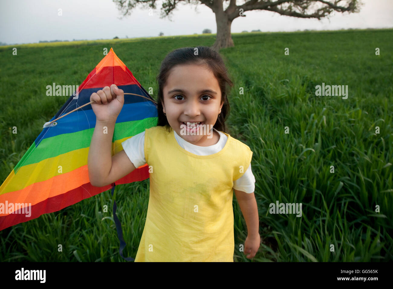 Portrait of a girl with a kite Stock Photo