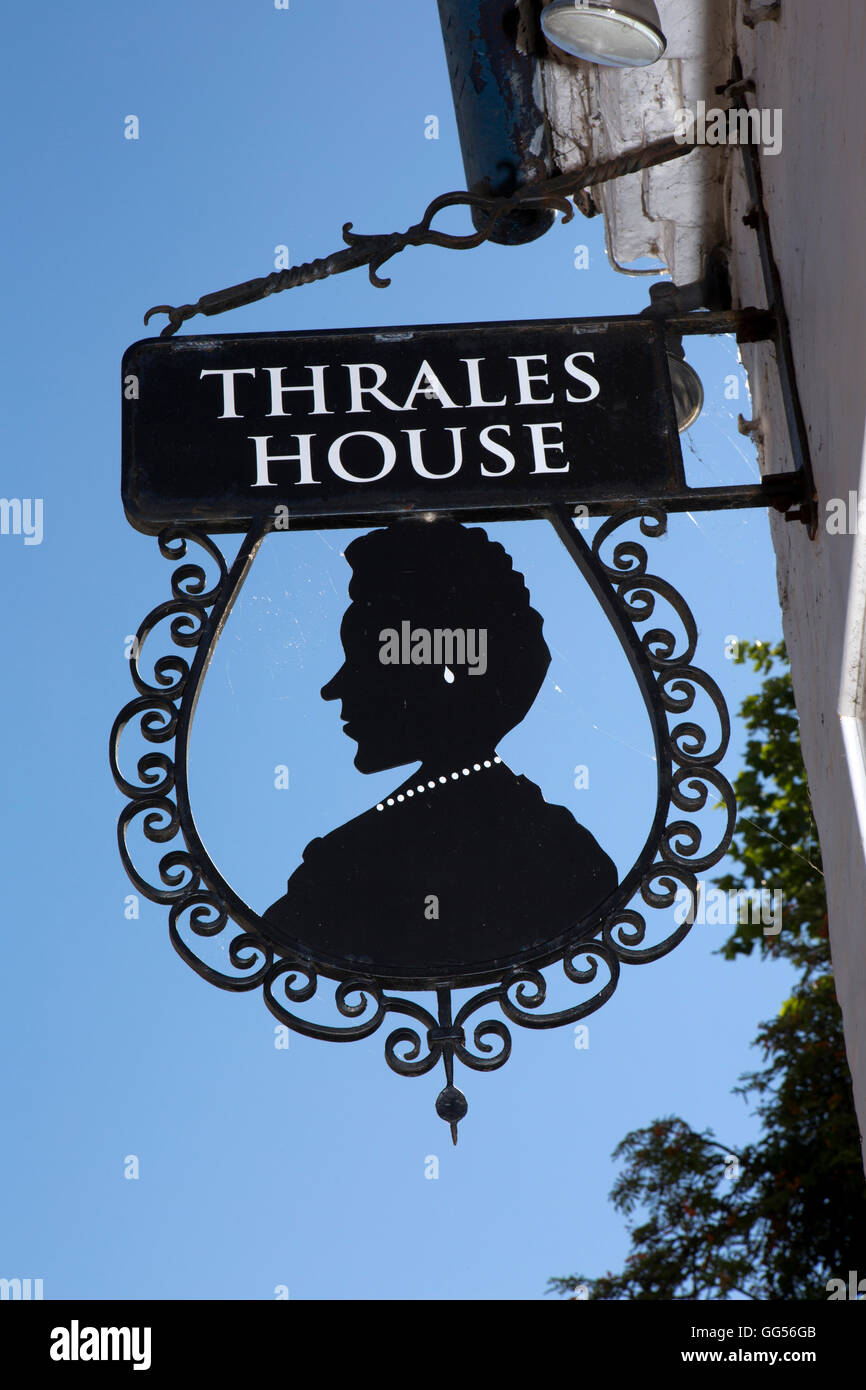 UK, England, Staffordshire, Lichfield, Tamworth Street, Thrales House lady’s head silhouette sign Stock Photo