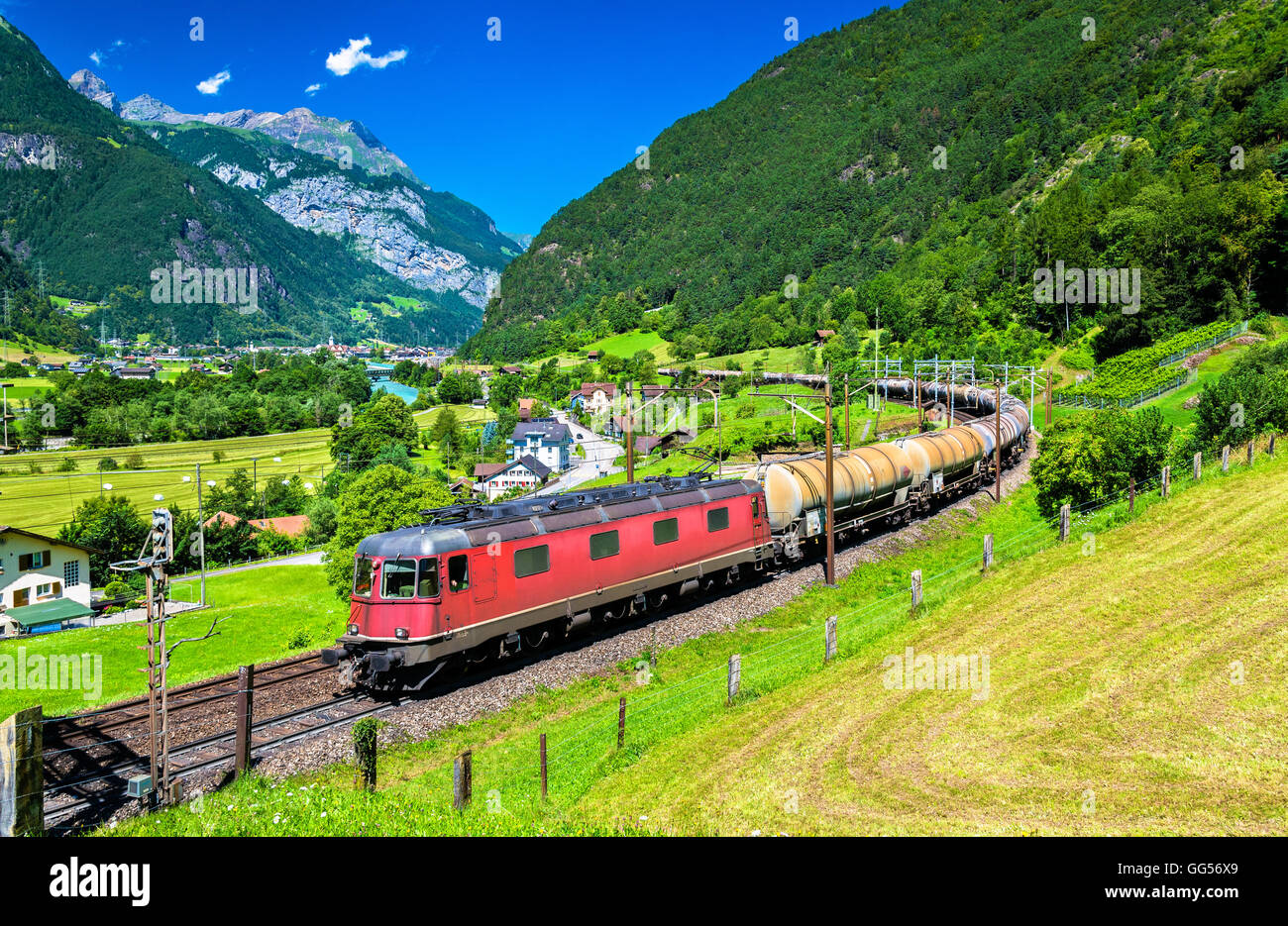 Freight train climbs up the Gotthard railway - Switzerland Stock Photo