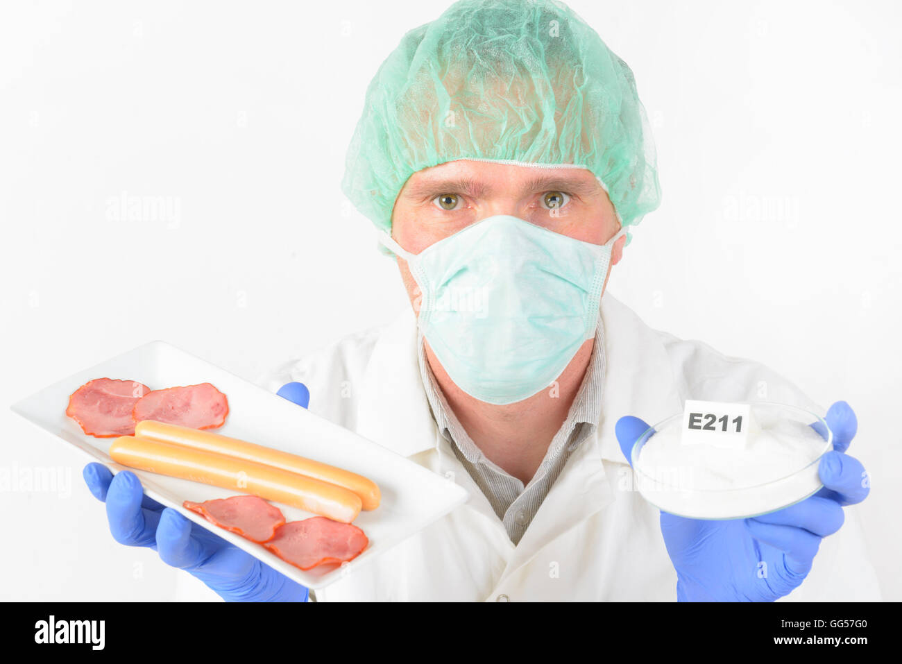 Researcher presenting preservatives substances that are added to products such as foods, pharmaceuticals, paints, biological sam Stock Photo