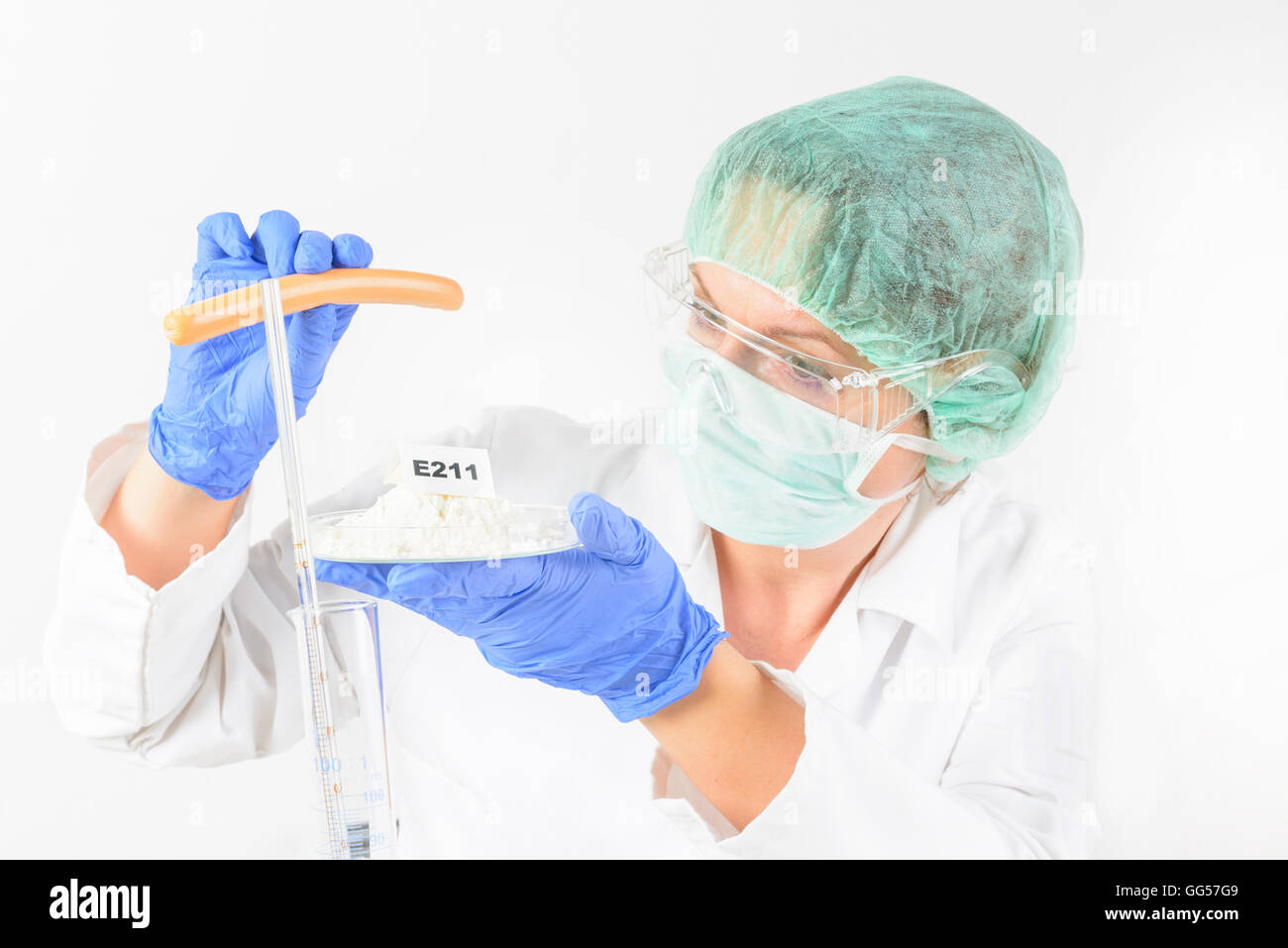 Researcher presenting preservatives substances that are added to products such as foods, pharmaceuticals, paints, biological sam Stock Photo