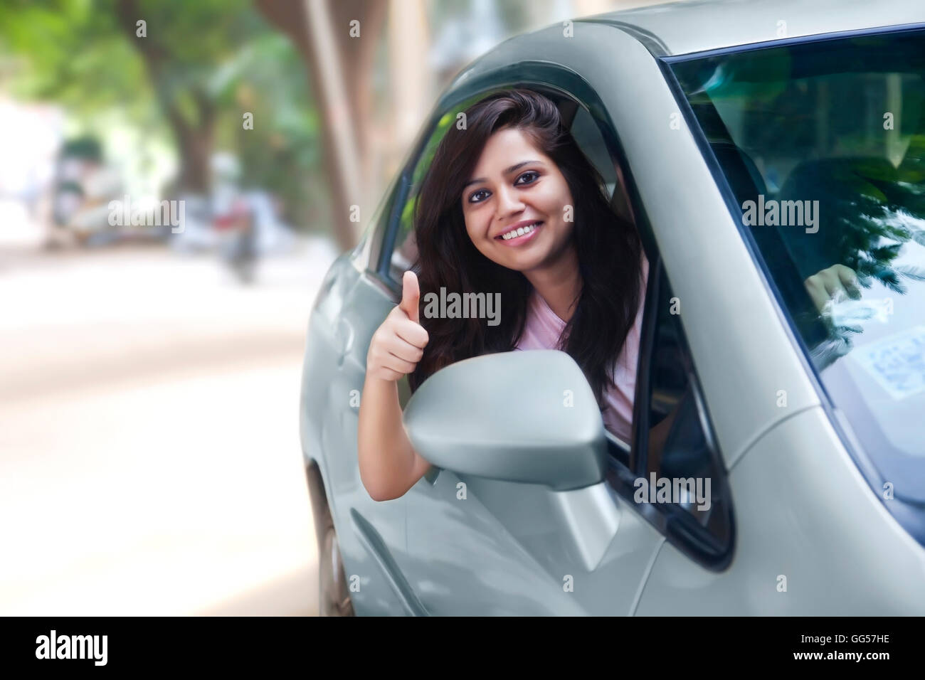 Indian woman showing thumbs up hi-res stock photography and images - Alamy