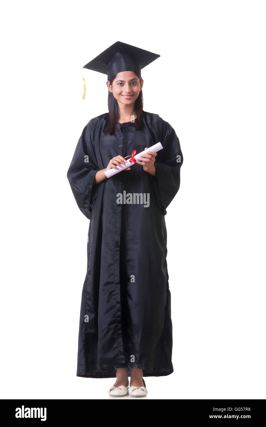 Full length portrait of female graduate student holding diploma over ...