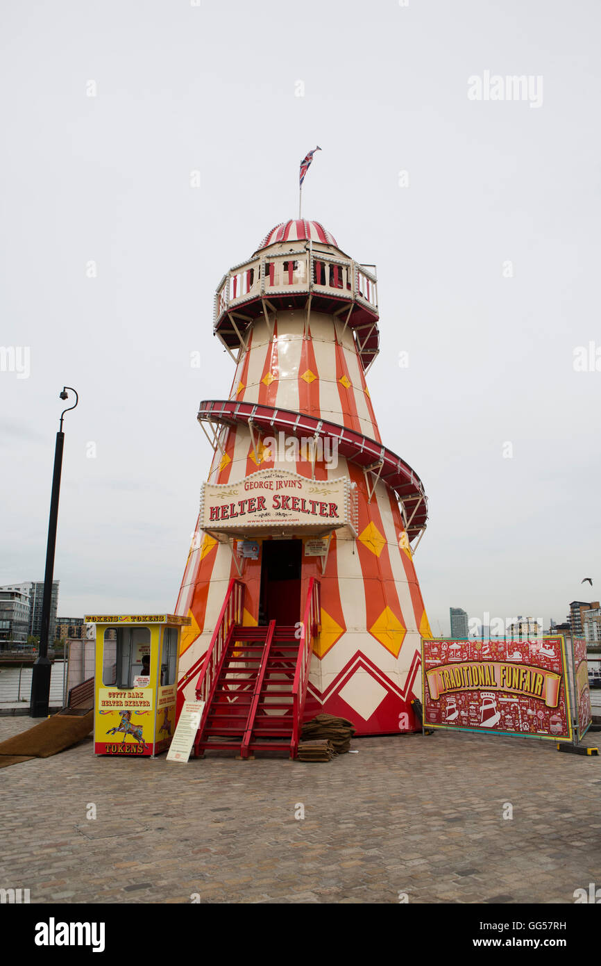 A Helter Skelter at Greenwich in London, England. The attraction, operated by George Irvin, is part of a traditional funfair. Stock Photo