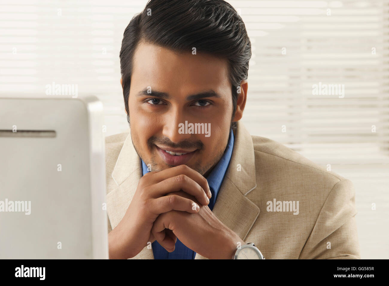 Portrait of confident young businessman in office Stock Photo
