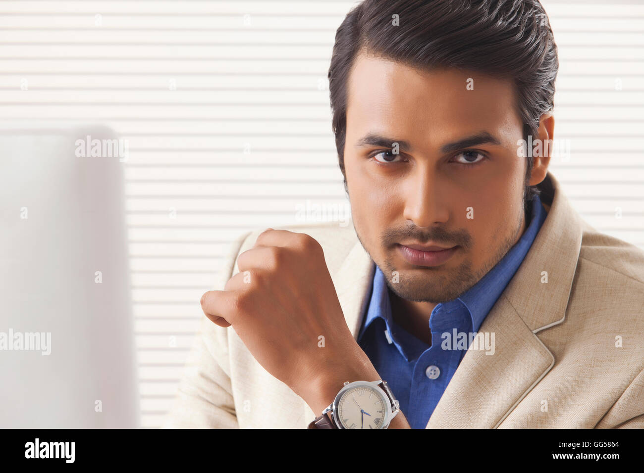 Portrait of confident young businessman at office Stock Photo