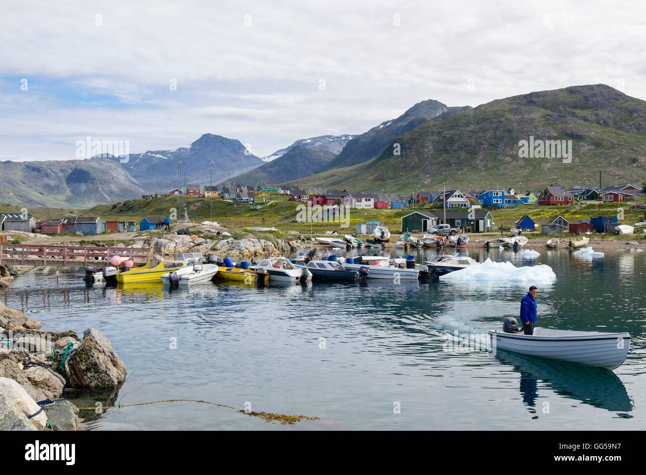 Small boats in harbour used by Inuit and locals for fishing and hunting in summer. Qajaq Harbour, Narsaq, Kujalleq, Southern Greenland Stock Photo
