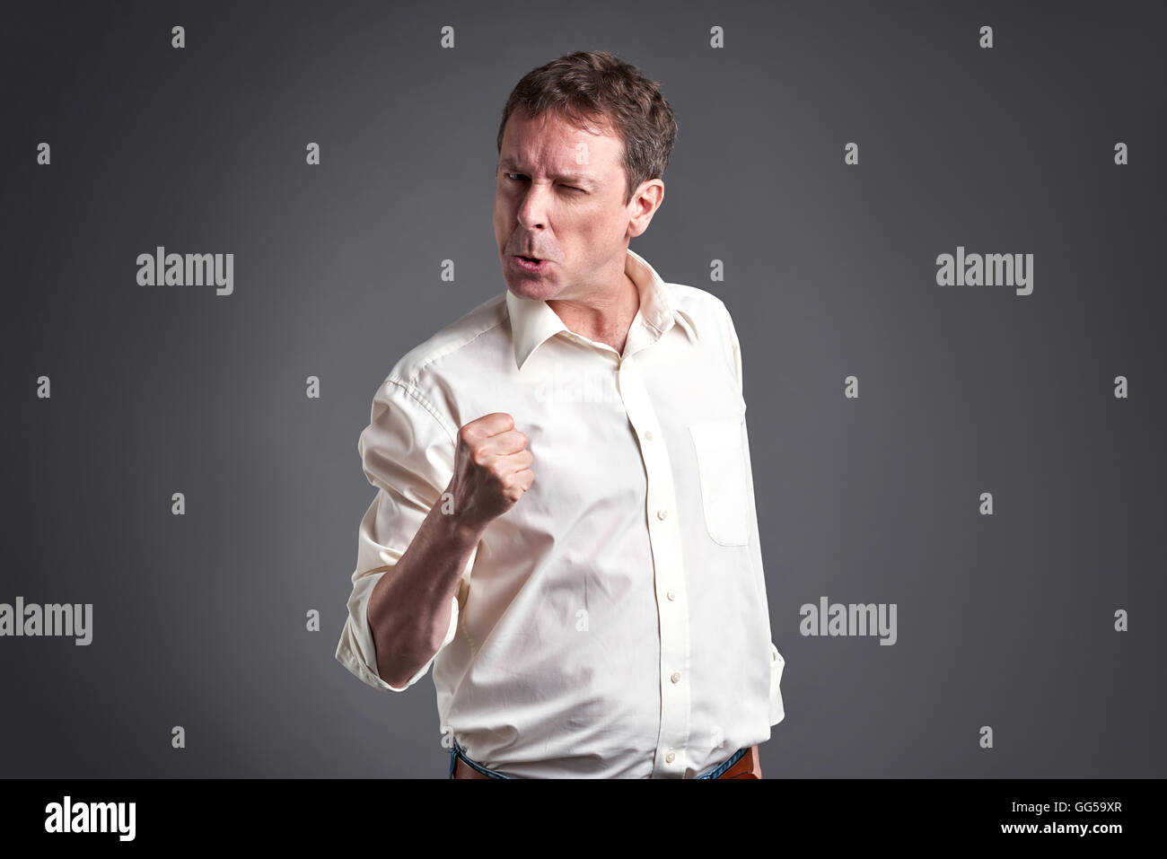 Portrait of a angry middle age man getting fury Stock Photo - Alamy